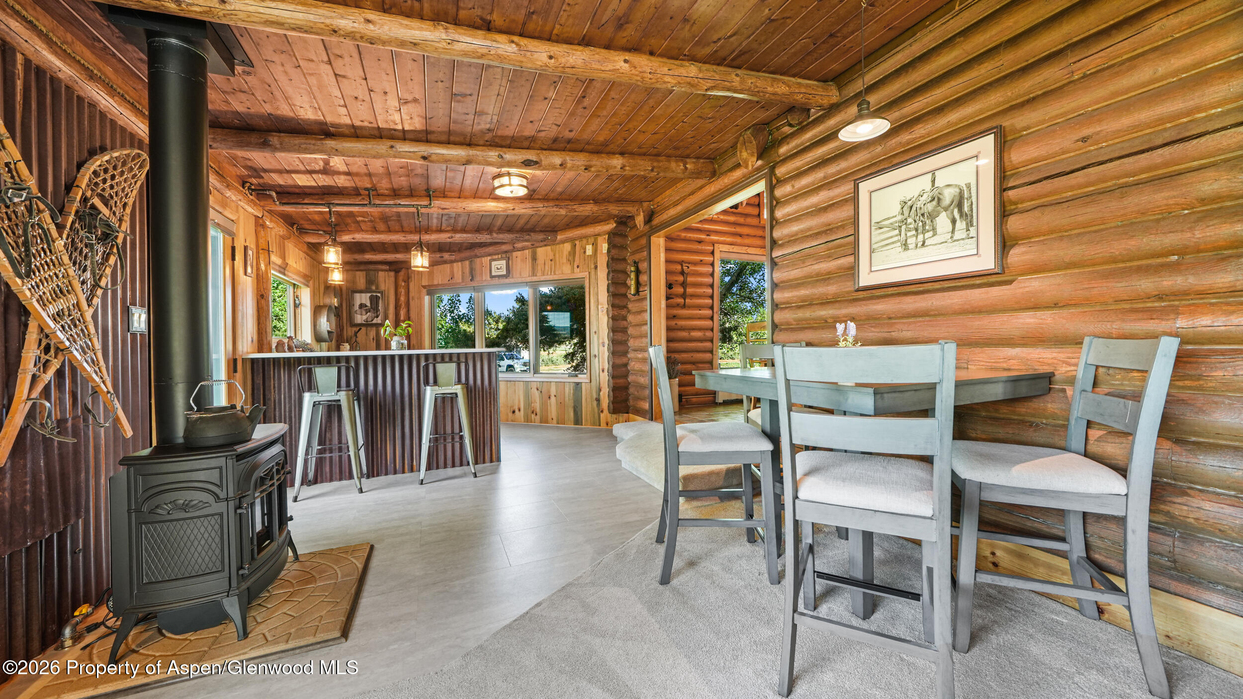 1355 N Road Loma, CO 81524 - Photo 22 of 51 a view of a dining room with furniture window and outside view