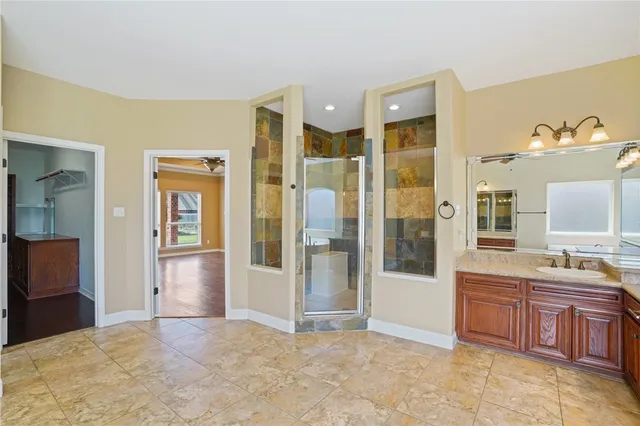 a white toilet sitting next to a small sink