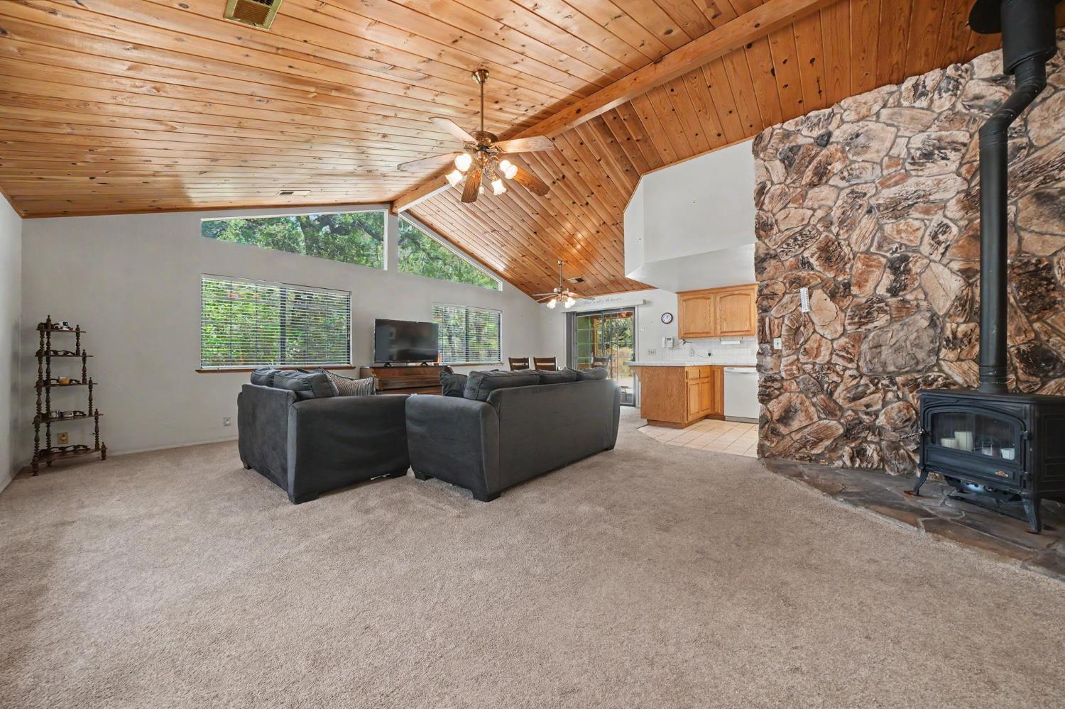 20310 State Rte 26 West Point, CA 95255 - Photo 7 of 57 a living room with furniture and a fireplace