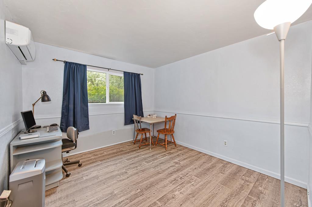 6689 Rhodes Avenue Placerville, CA 95667 - Photo 26 of 60 a view of a workspace with furniture and a window