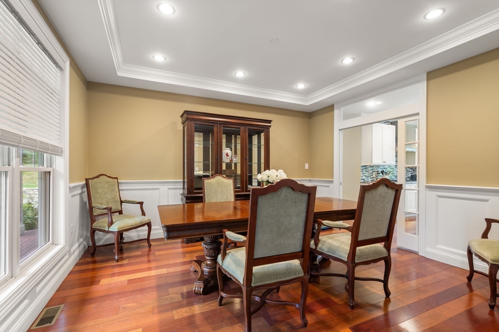 24 Wayside Inn Road Framingham, MA 01701 - Photo 19 of 38 a dining room with furniture and wooden floor