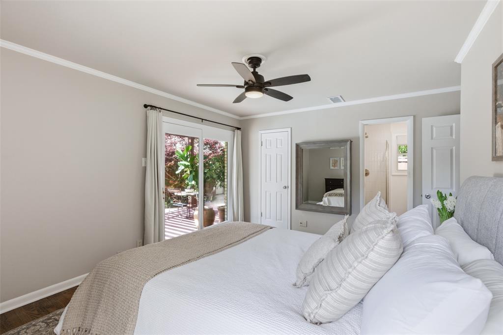 717 Ridgedale Drive Richardson, TX 75080 - Photo 25 of 40 Primary bedroom has its own private access to the backyard and pool area.