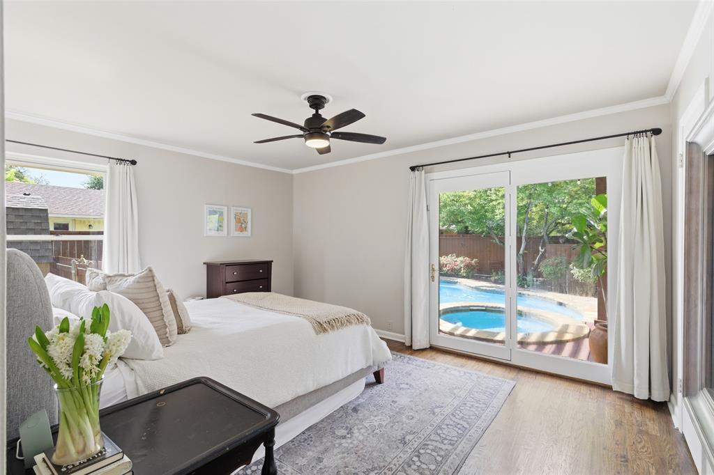 717 Ridgedale Drive Richardson, TX 75080 - Photo 26 of 40 Private primary bedroom with wonderful view to the pool and spa area.