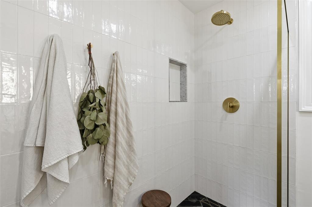 717 Ridgedale Drive Richardson, TX 75080 - Photo 28 of 40 Negative edge walk in shower in primary bathroom