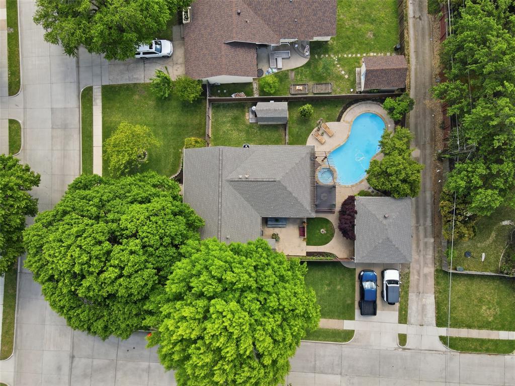 717 Ridgedale Drive Richardson, TX 75080 - Photo 38 of 40 Great corner lot with stunning mature trees that provide lots of shade.