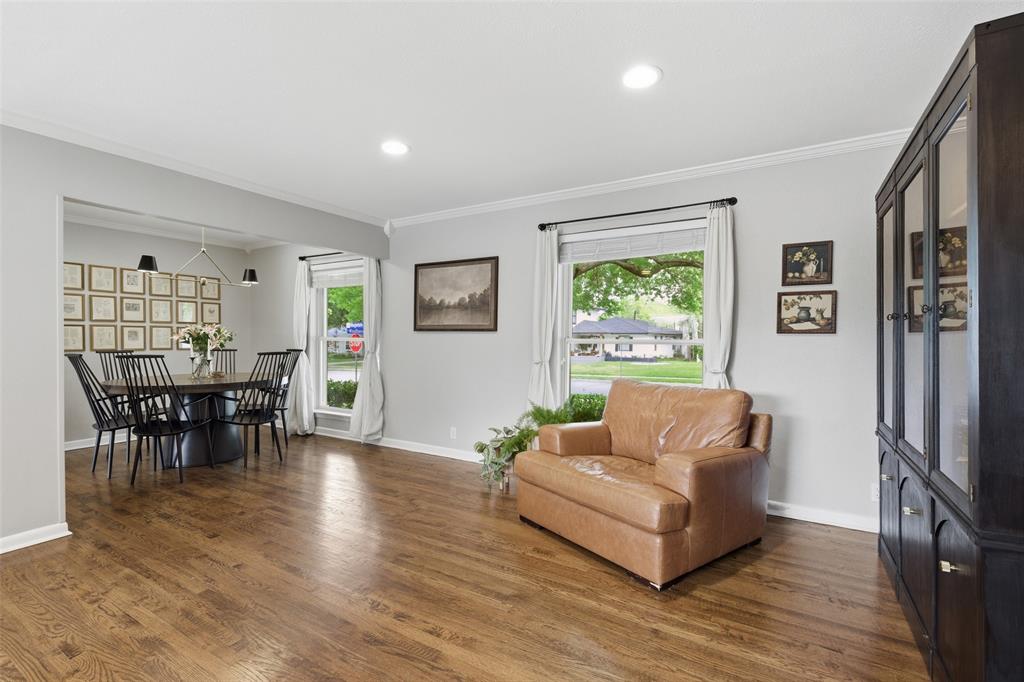 717 Ridgedale Drive Richardson, TX 75080 - Photo 7 of 40 Looking back from the main part of the living room out to the large front yard and the stunning dining room.