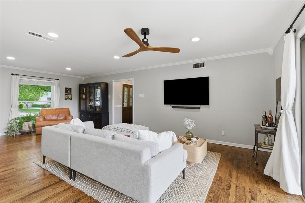 717 Ridgedale Drive Richardson, TX 75080 - Photo 10 of 40 Another viewpoint from the back door to the living room and entry way.