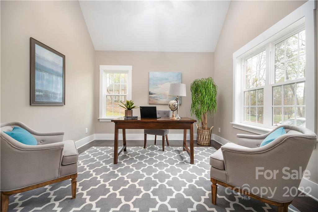 240 Patternote Road Mooresville, NC 28117 - Photo 7 of 47 a living room with furniture a window and a potted plant