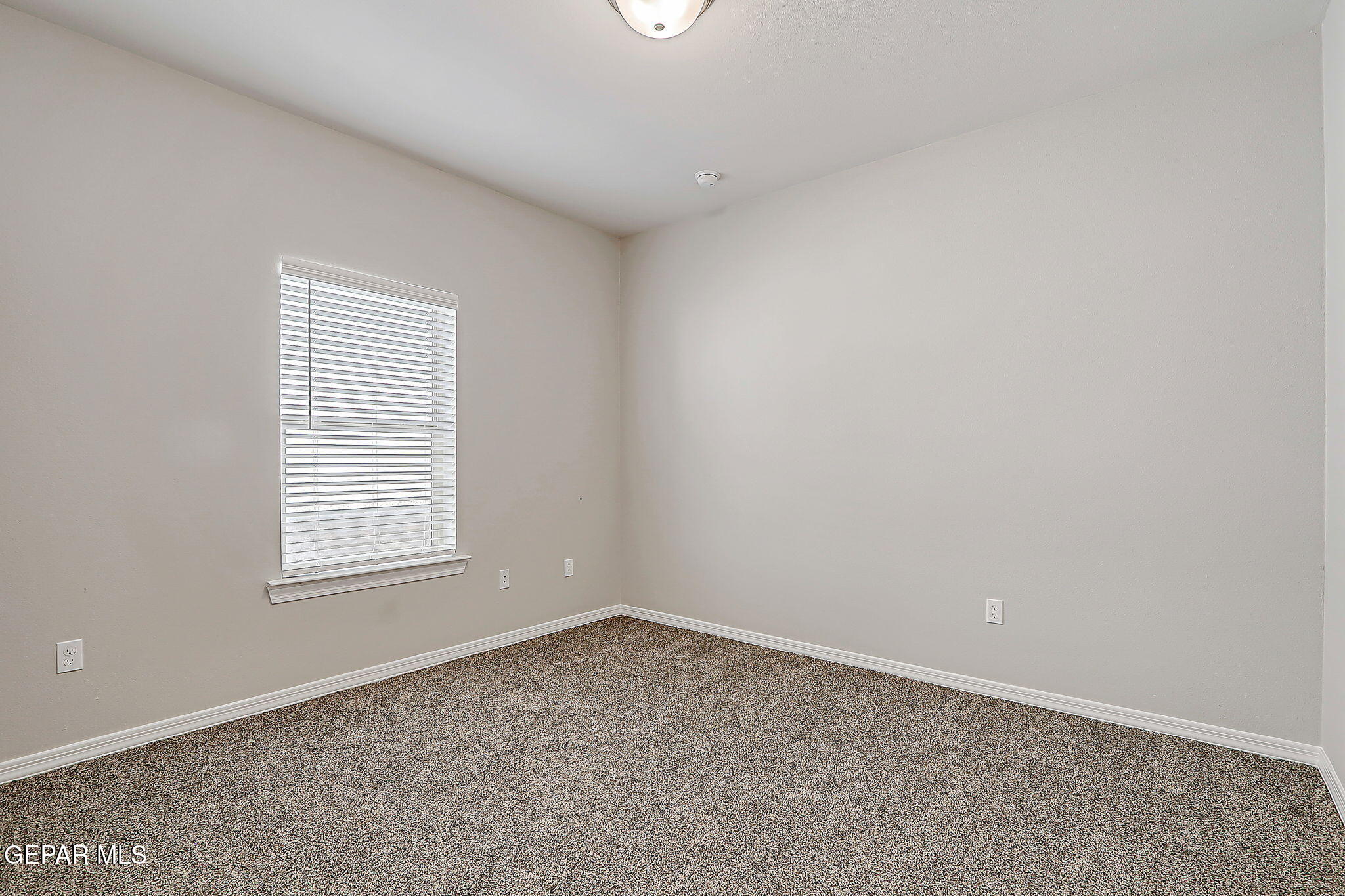 3949 Perspective Street El Paso, TX 79938 - Photo 13 of 22 an empty room with a window
