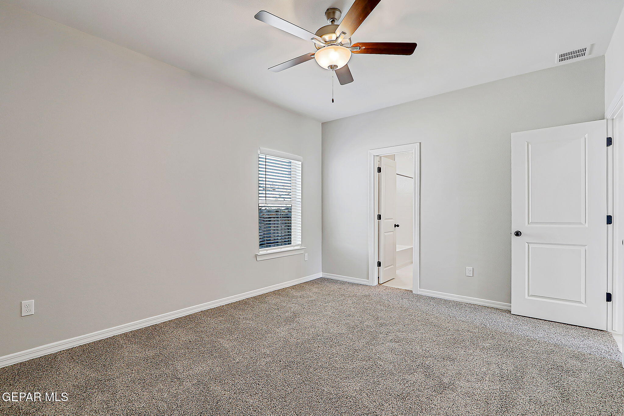 3949 Perspective Street El Paso, TX 79938 - Photo 16 of 22 a view of an empty room with a window
