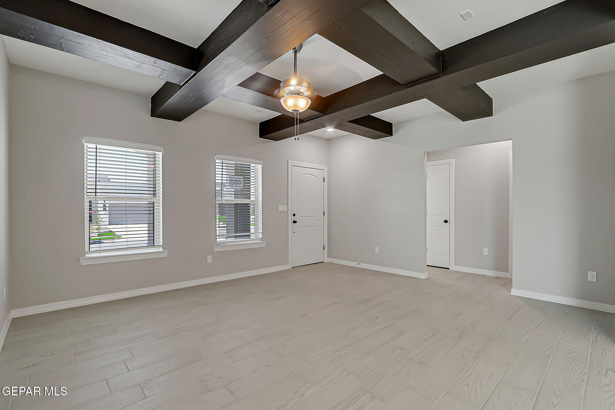 3949 Perspective Street El Paso, TX 79938 - Photo 5 of 22 a view of an empty room with a window