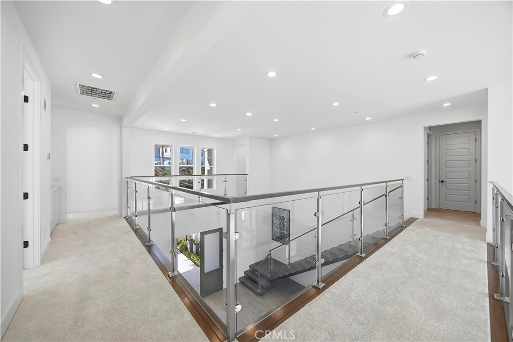 20138 Marlow Lane Porter Ranch, CA 91326 - Photo 15 of 39 a view of a hallway with stairs