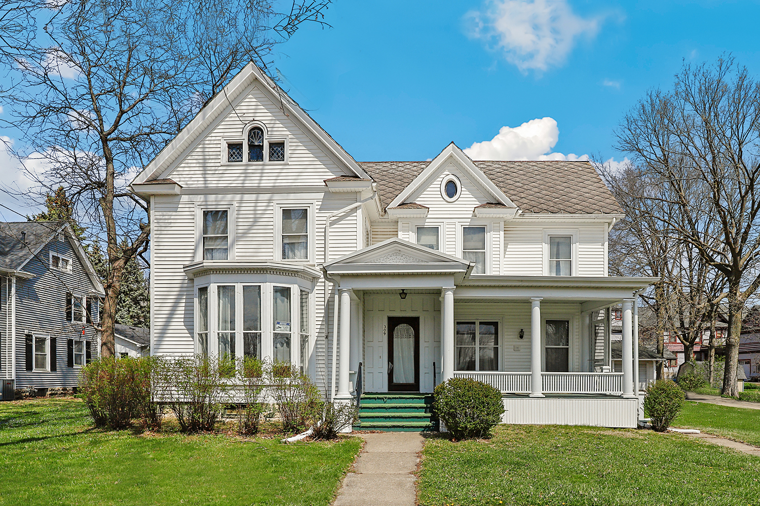 a front view of a house with garden