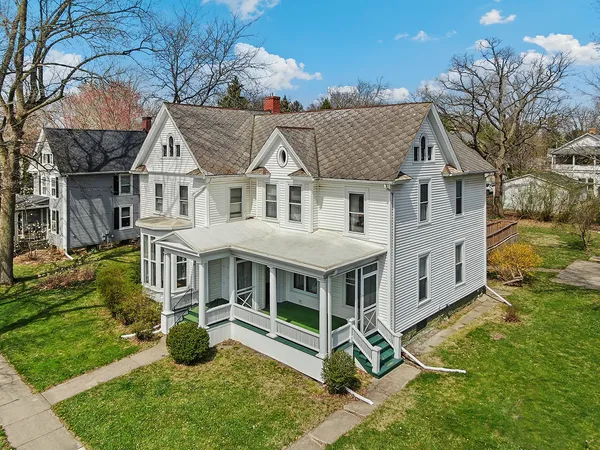 front view of a house with a yard