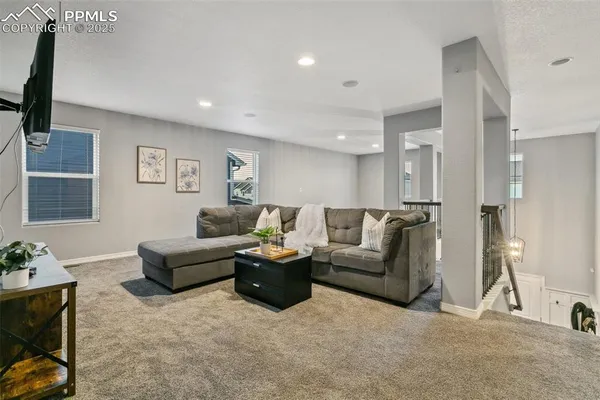 a living room with furniture and a couch