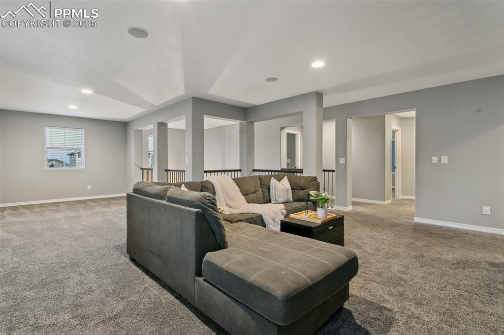 9632 Emerald Vista Drive Peyton, CO 80831 - Photo 18 of 45 a living room with furniture and a window