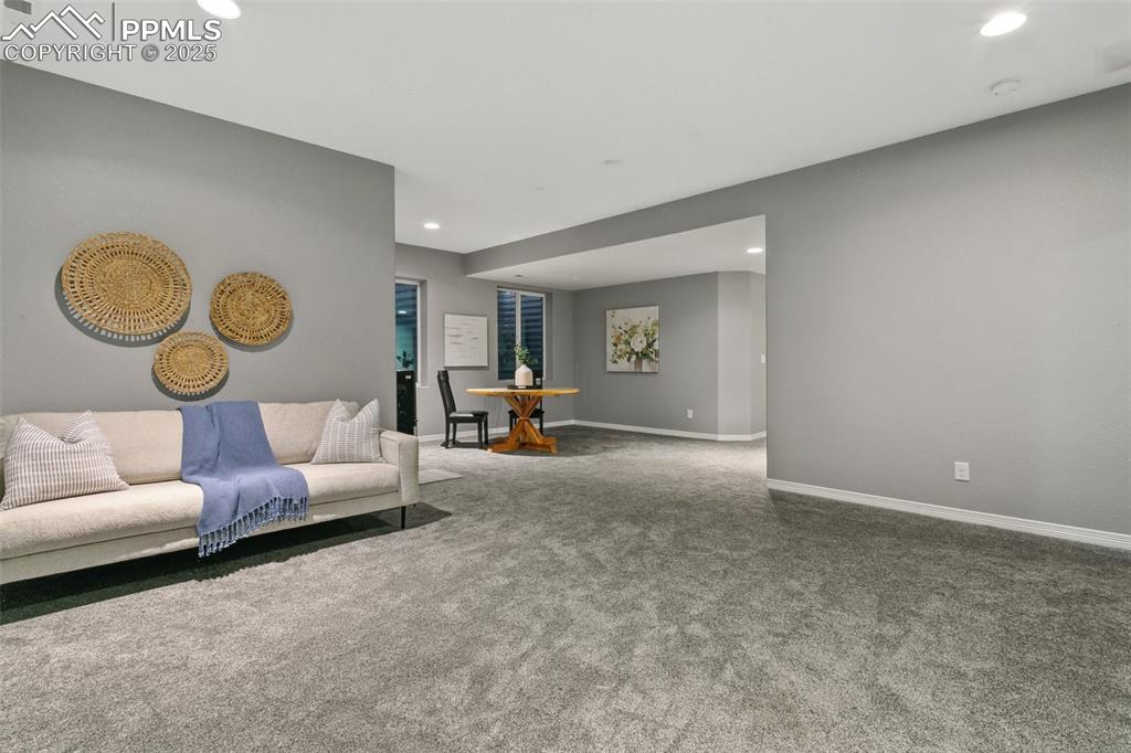 9632 Emerald Vista Drive Peyton, CO 80831 - Photo 31 of 45 a living room with furniture and a window