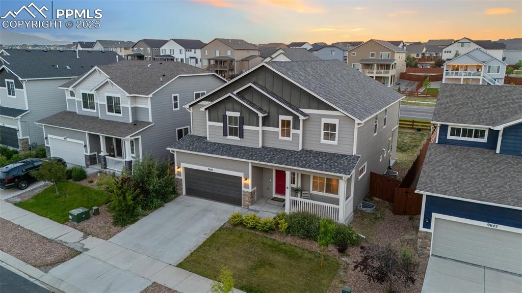 9632 Emerald Vista Drive Peyton, CO 80831 - Photo 42 of 45 an aerial view of a house with a yard