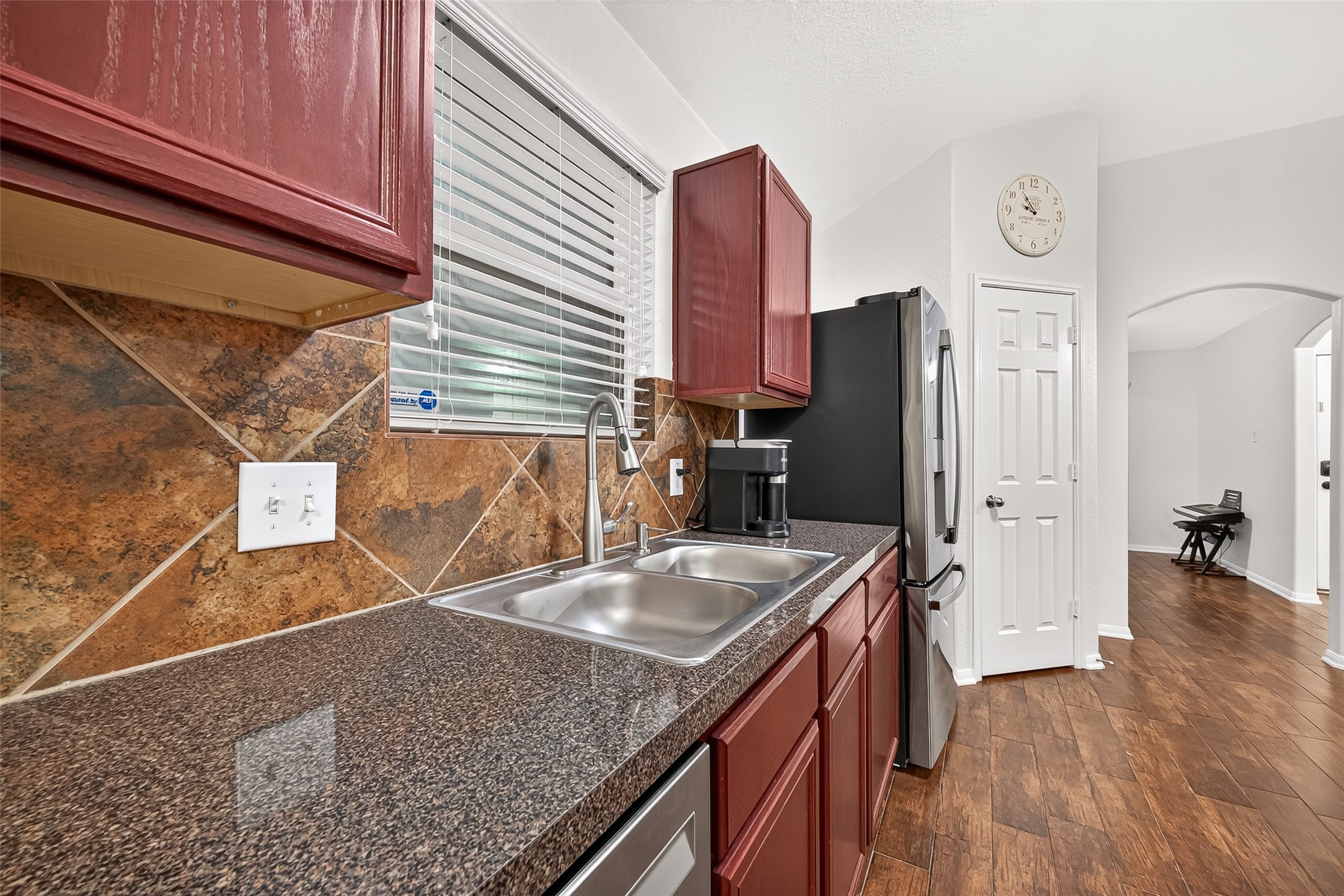 3155 View Valley Trail Katy, TX 77493 - Photo 25 of 50 Detail shot of the polished countertops, dual sink, and excellent cabinet storage options.