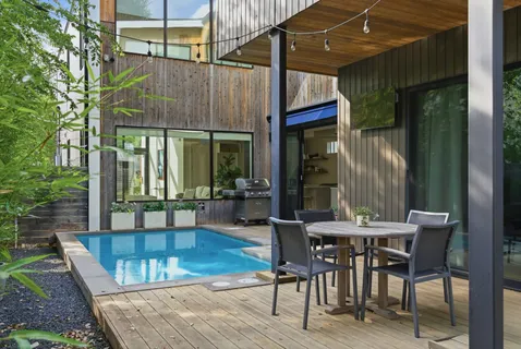 a view of a dinning tables and chairs in the patio
