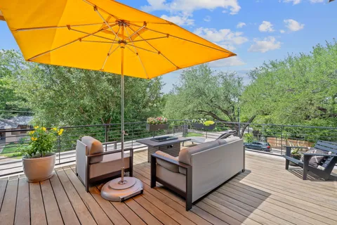 a view of a couches on the roof deck