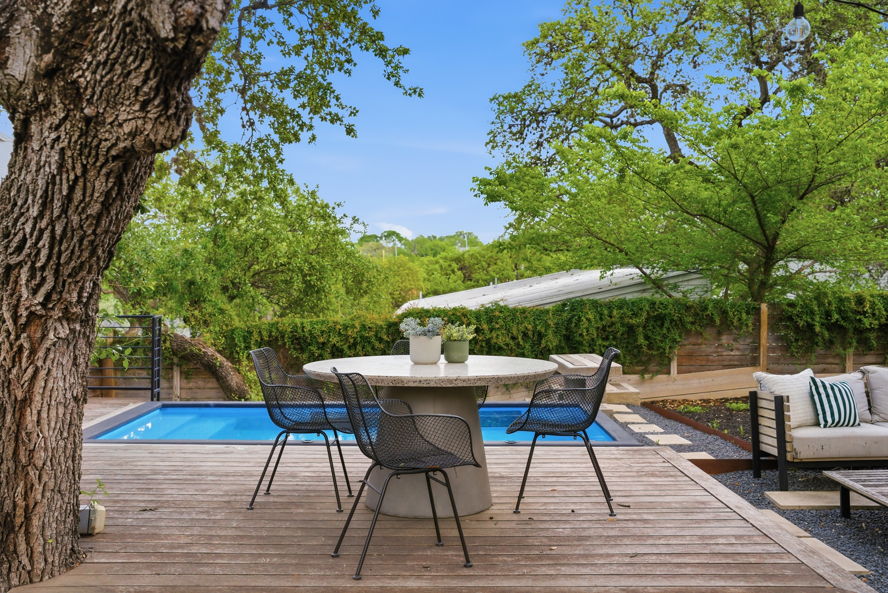 1605 Chelsea Lane Austin, TX 78704 - Photo 36 of 40 a view of a chairs and table in the patio