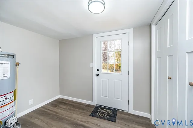 a view of a kitchen with wooden floor