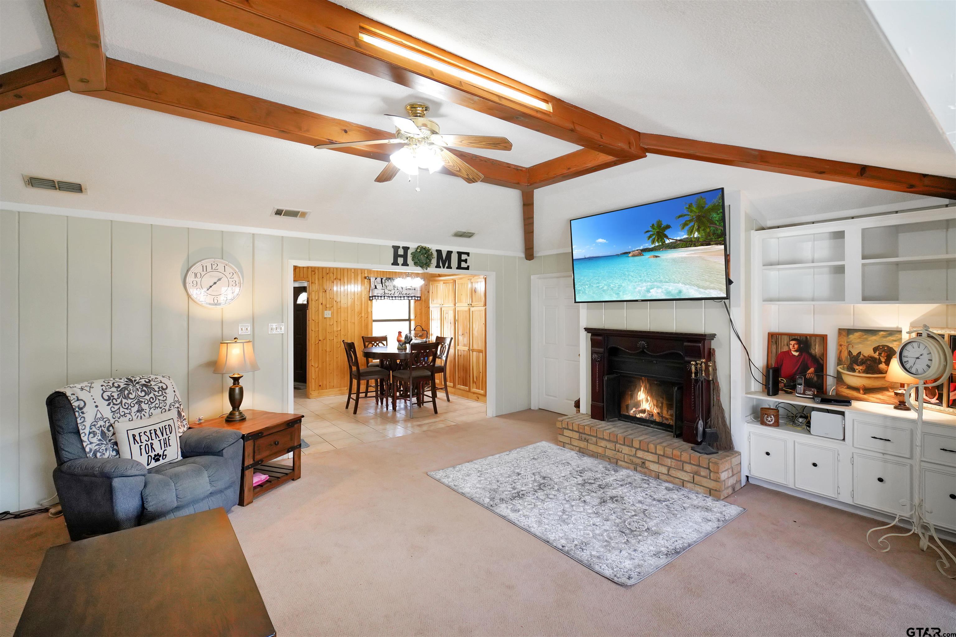 120 Rainbow Cove Holly Lake Ranch, TX 75765 - Photo 11 of 39 a living room with furniture and a fireplace