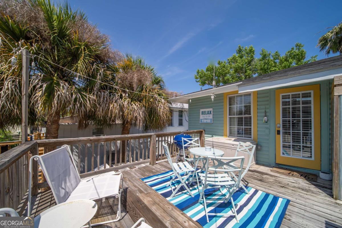 1413 2nd Avenue, Unit 2 Tybee Island, GA 31328 - Photo 24 of 30 a view of a patio on the deck