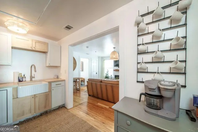 a kitchen with stainless steel appliances a stove and a refrigerator