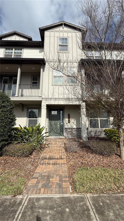 7718 Sweet Star Avenue Orlando, FL 32836 - Photo 1 of 51 a front view of a house with yard