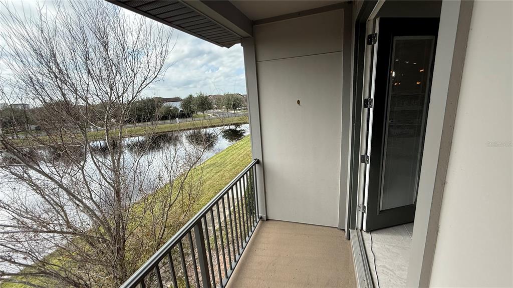 7718 Sweet Star Avenue Orlando, FL 32836 - Photo 19 of 51 a view of balcony with outdoor space