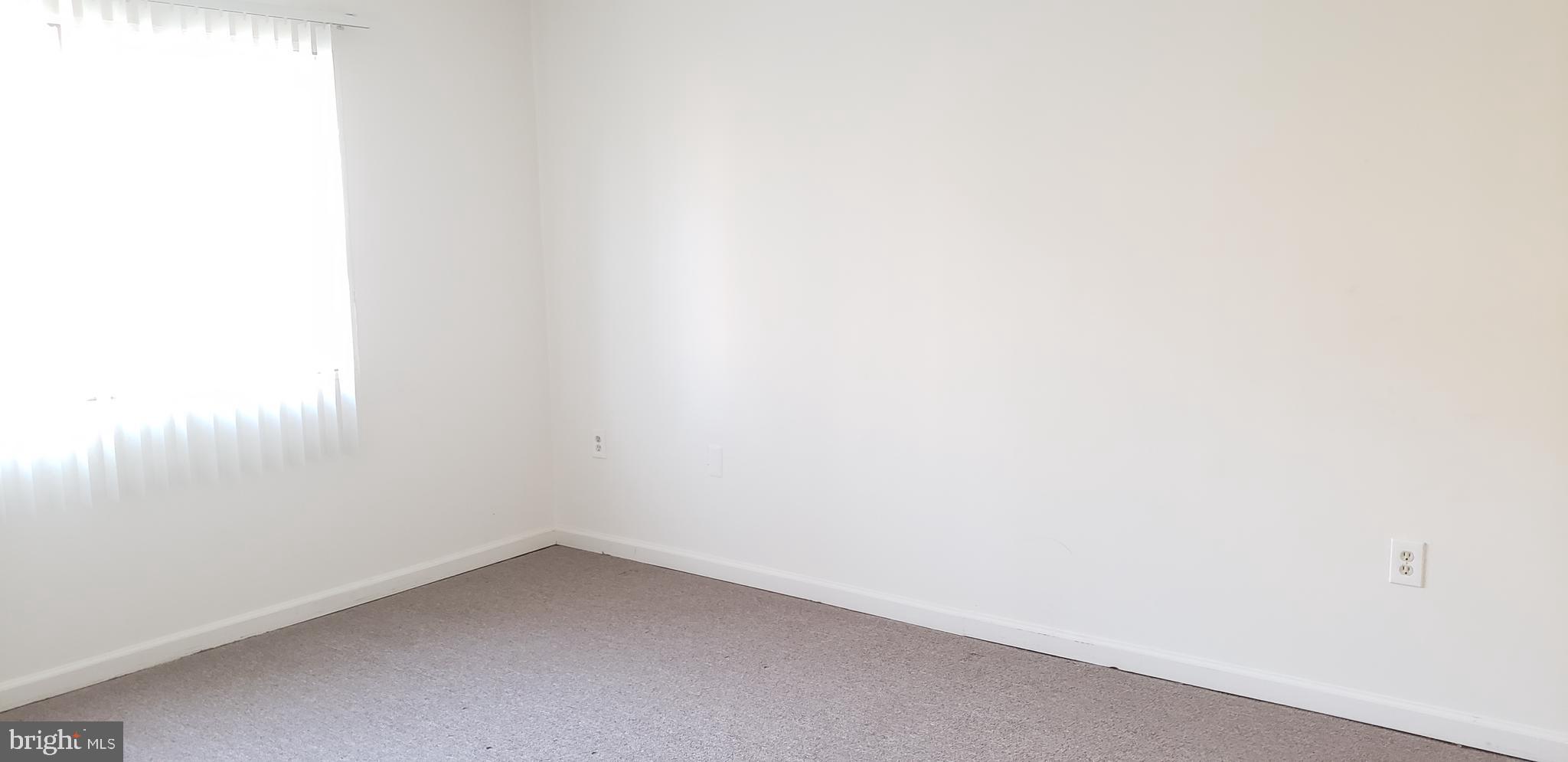 3832 Bel Pre Road, Unit 7105 Silver Spring, MD 20906 - Photo 8 of 19 Large Bedroom with Picture Window