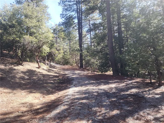 a view of road with with cars