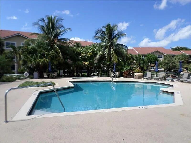 8781 Wiles Road, Unit 203 Coral Springs, FL 33067 - Photo 16 of 17 8781-swimming pool