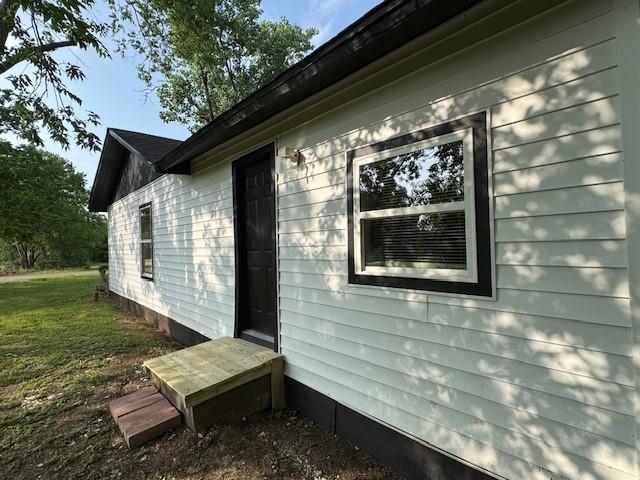 727 East 3rd Street McGregor, TX 76657 - Photo 5 of 24 Primary bedroom exterior door