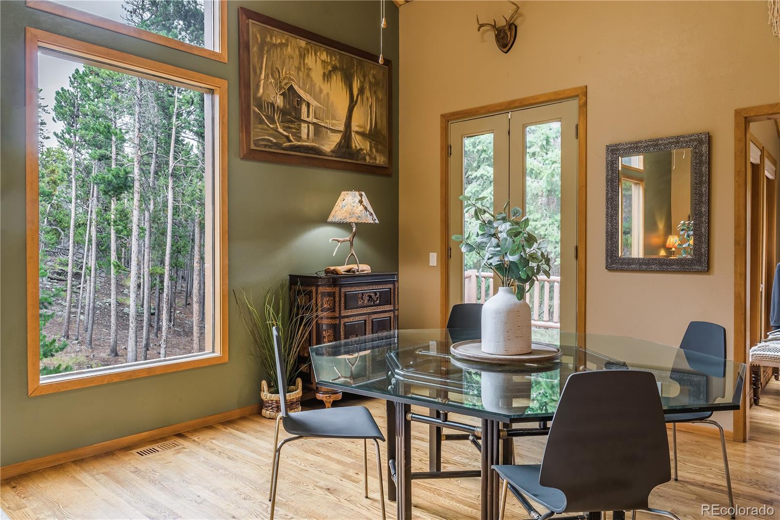 37 Juniper Court Evergreen, CO 80439 - Photo 13 of 44 a living room with furniture and a window