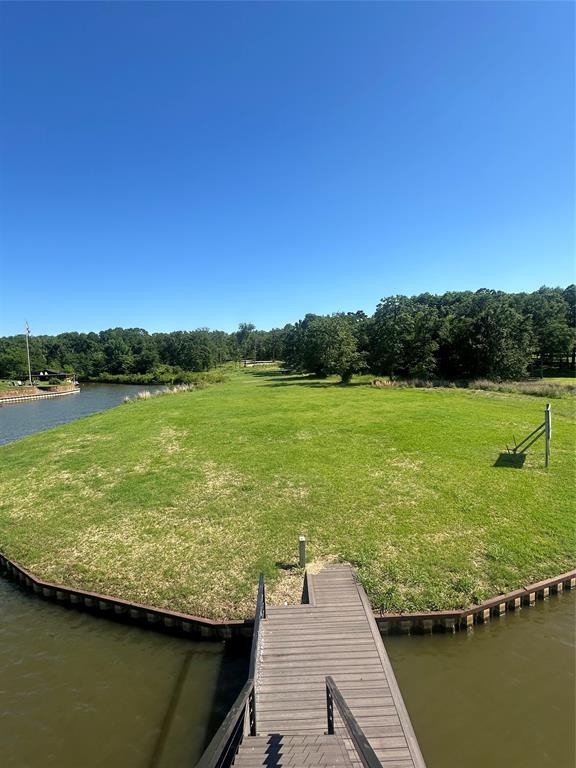 14192 Ridge Lane Malakoff, TX 75148 - Photo 1 of 14 a view of a lake with a big yard