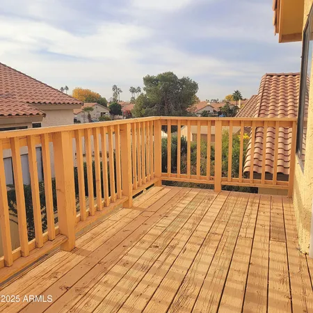 a view of wooden floor with a lake view
