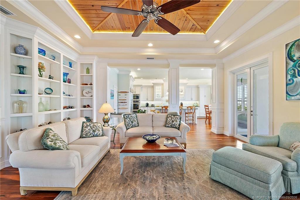 4105 Rigels Cove Way Jensen Beach, FL 34957 - Photo 69 of 80 a living room with furniture and a large window