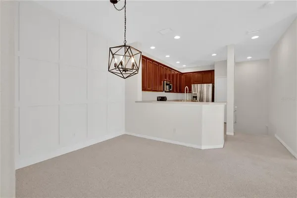 an aerial view of residential houses with city view