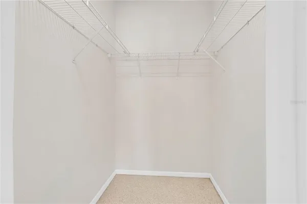 an aerial view of a house with a lake view