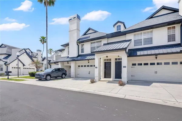 a kitchen with stainless steel appliances granite countertop a stove microwave and cabinets