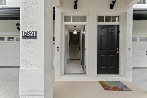 a kitchen with stainless steel appliances a refrigerator and a stove