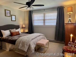 38 Timber Lane, Unit 1 Waterbury, CT 06705 - Photo 14 of 15 a bedroom with a bed and a window