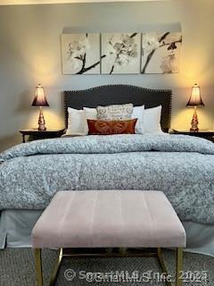 38 Timber Lane, Unit 1 Waterbury, CT 06705 - Photo 15 of 15 a bathroom with a bathtub and mirror