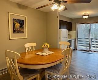 38 Timber Lane, Unit 1 Waterbury, CT 06705 - Photo 2 of 10 a view of a dining room with furniture