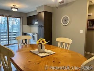 38 Timber Lane, Unit 1 Waterbury, CT 06705 - Photo 3 of 10 a view of a dining room with furniture