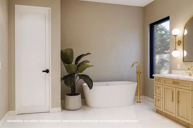 a bathroom with a sink and mirror