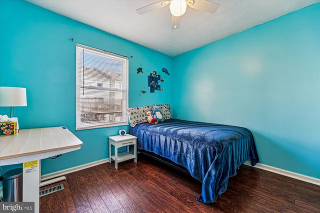 a room with furniture and a flat screen tv